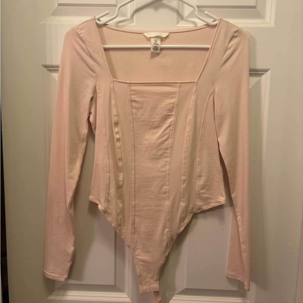 Long sleeve pink bodysuit